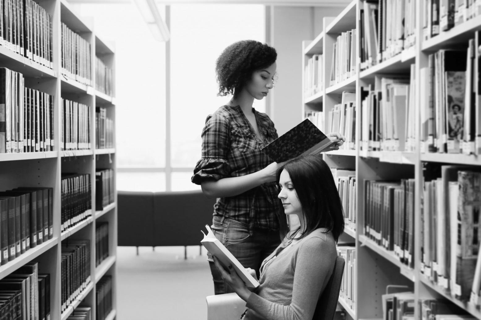 Computer screen showing investment portfolio dashboard with charts, graphs, and real-time market data interfaces